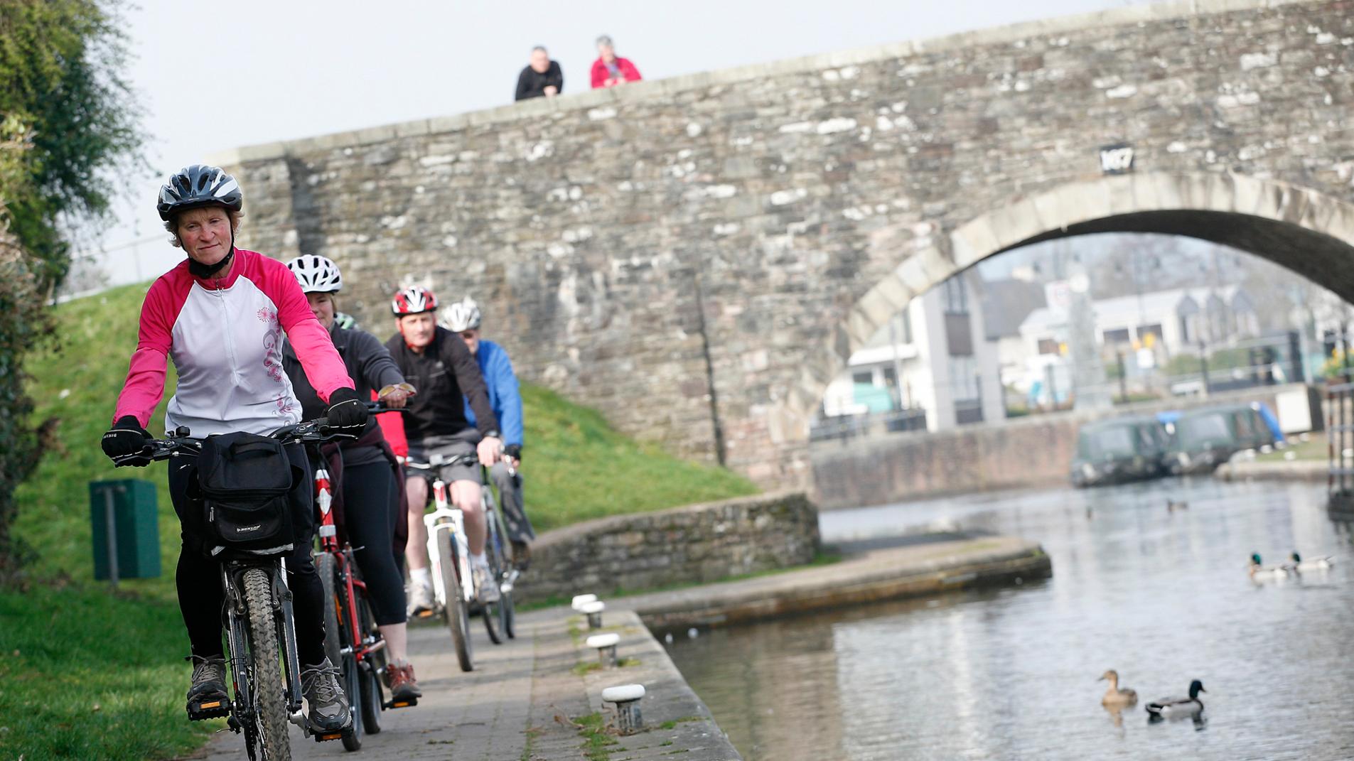 Cyclists along the Brecon Canal