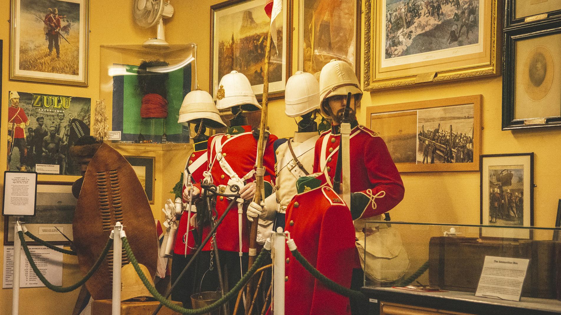Image shows regimental uniforms in Brecon Museum 